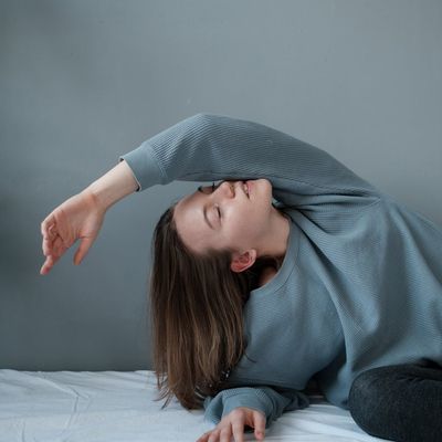 Soft grey background providing a sense of calm and balance.